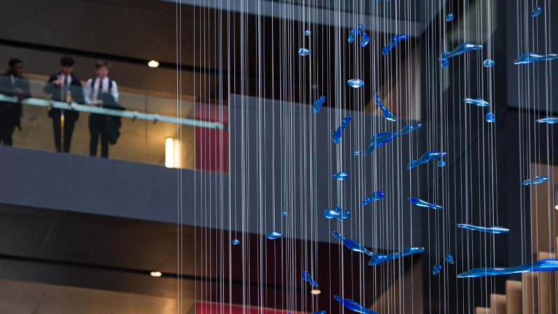 droplets suspended from the ceiling by 425 cables