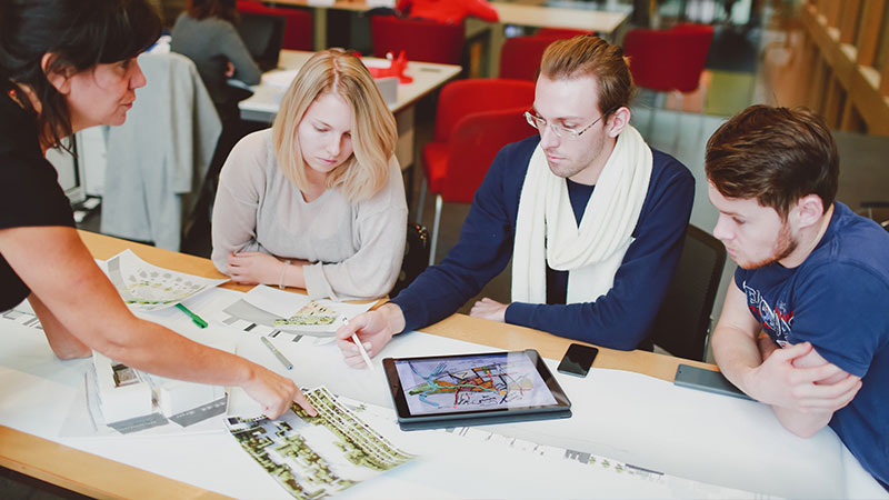 Group of Spatial Planning Studies, Qualifying Certificate students in a seminar on campus at Oxford Brookes University