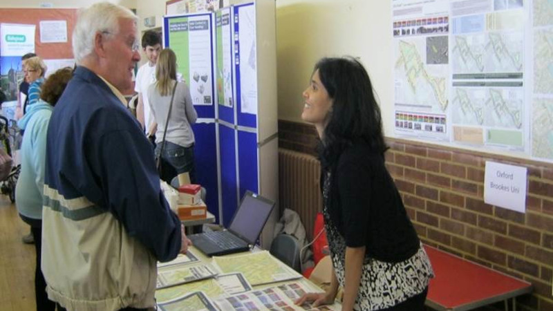 Researcher engaging with public on Carbon Mapping Research