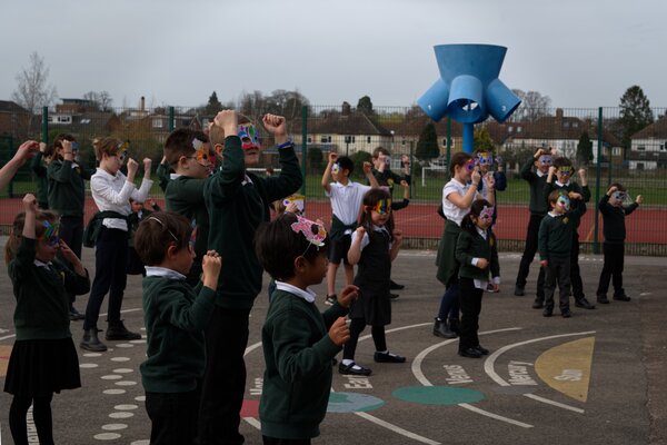 Pupils dancing in the playground