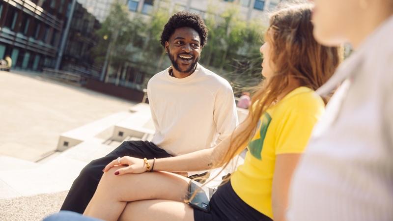 Students in conversation in the courtyard