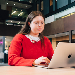 lucy-on-campus-using -a-laptop