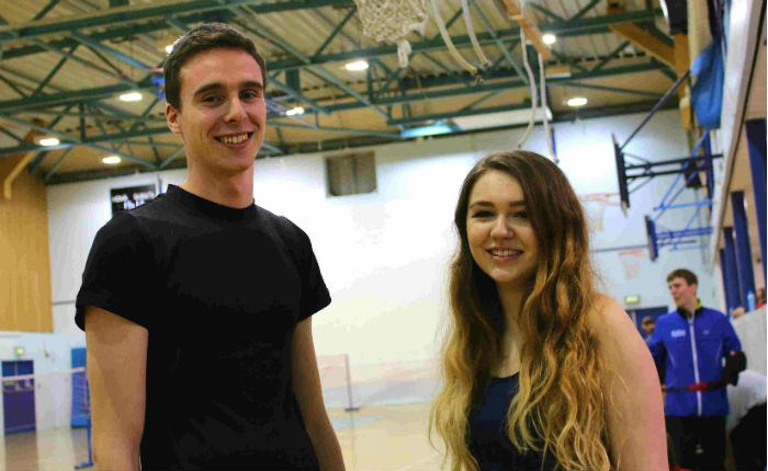 Two students taking part in a sport class