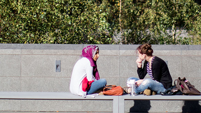 Two students on a bench