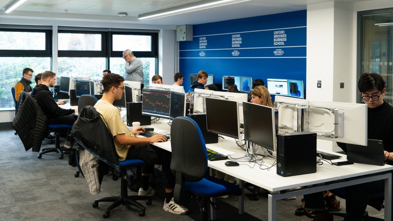 Photo of students using computers in Bloomberg Suite
