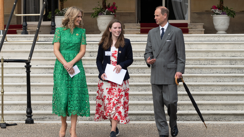 From left, television presenter Charlotte Hawkins, Emily Palmer and his Royal Highness Prince Edward, the Duke of Edinburgh at Buckingham Palace. Credit: Ian Smithers