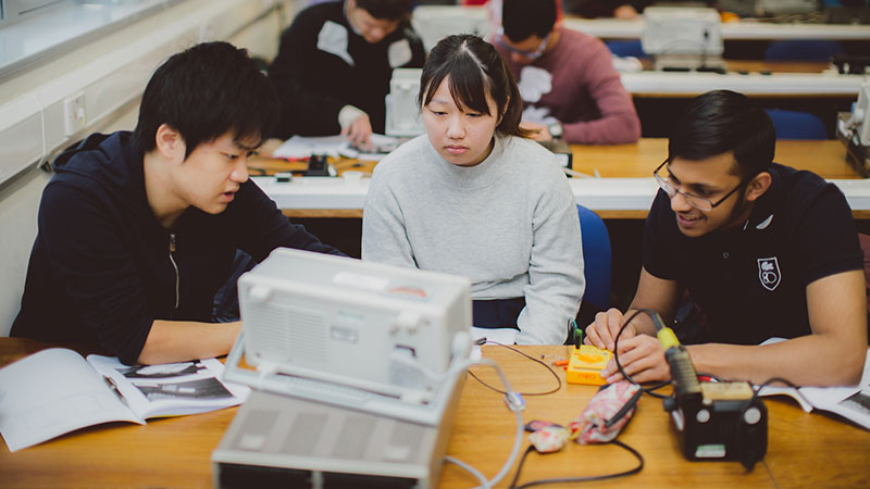 Electronic Engineering BEng (Hons) degree students learning in a practical session at Oxford Brookes University