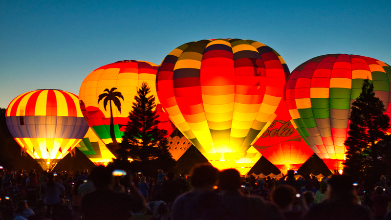 Evening scene of hot air balloons in different colours