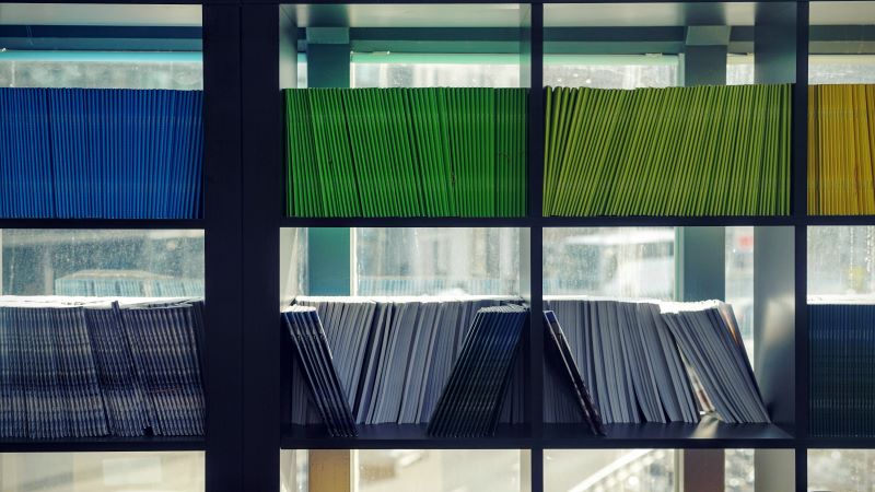 shelves of colourful documents