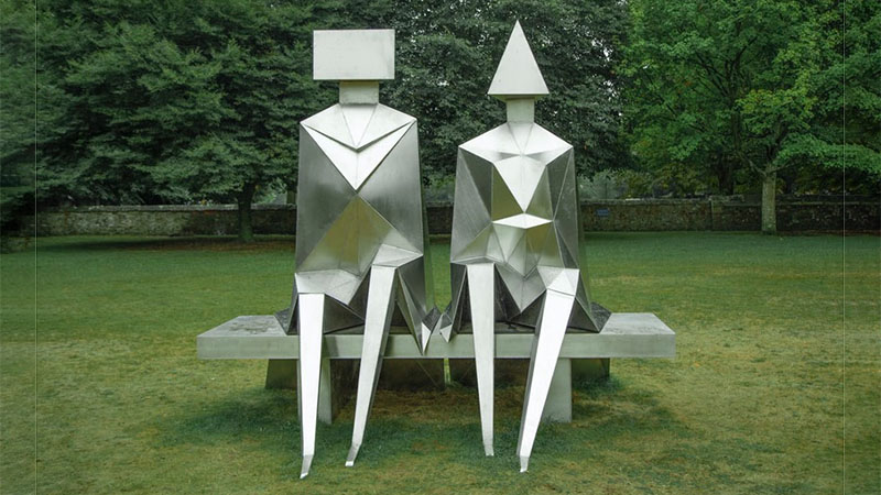 Metal man and woman sculpture